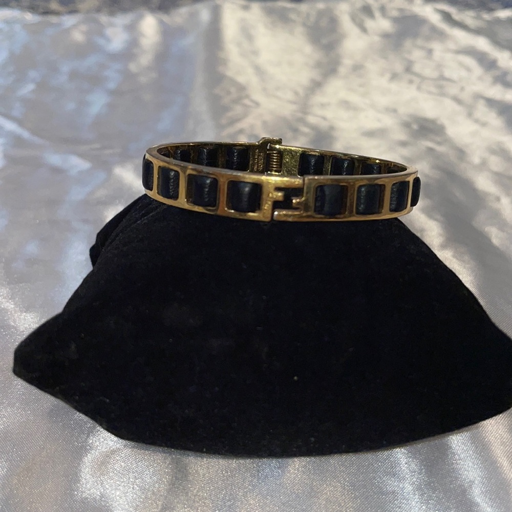 Fendi gold cuff with leather detail size small